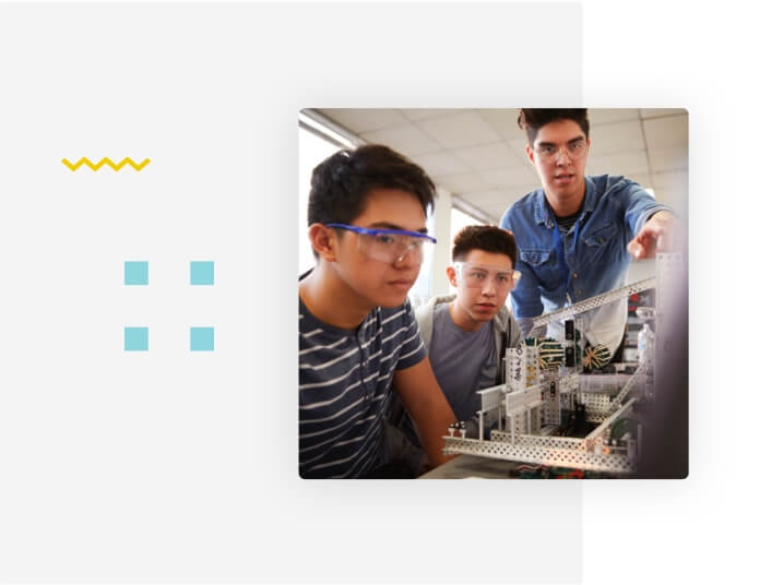 Teacher and students doing experiments at class