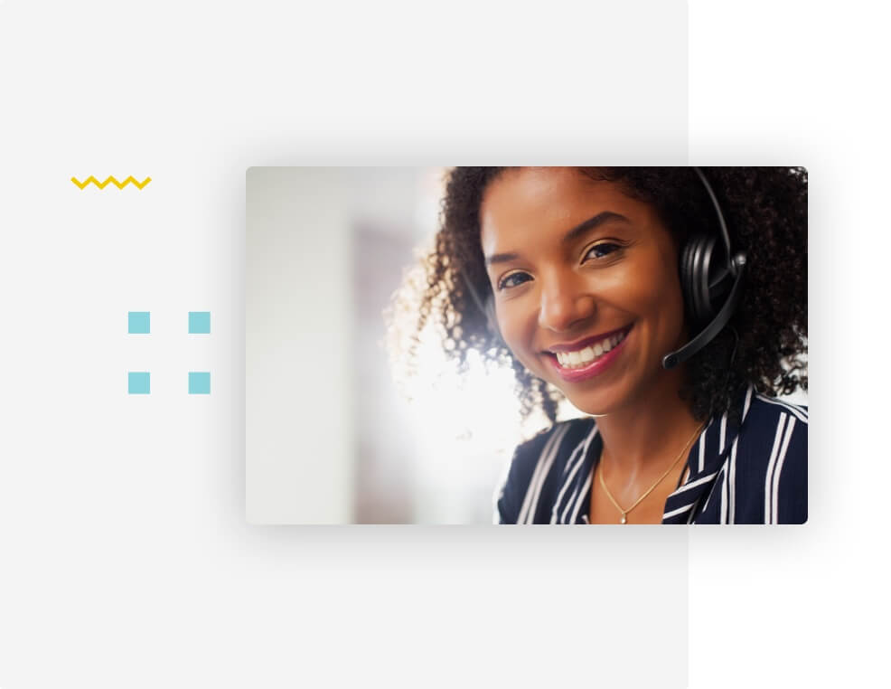 Women wearing a headset smiling to the camera